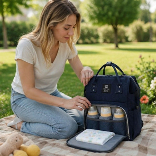 sac a langer maman qui sort un biberon